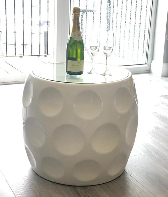 dimple designed golf ball table bottle of wine